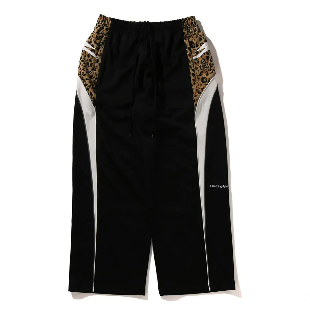 WILD LEOPARD PATTERN OVERSIZED FIT TRACK PANTS (BLACK)